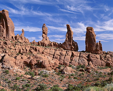 Eroded rock formations known as The Marching Men, Klondike Bluffs District, Arches National Park, Utah, United States of America (USA), North America