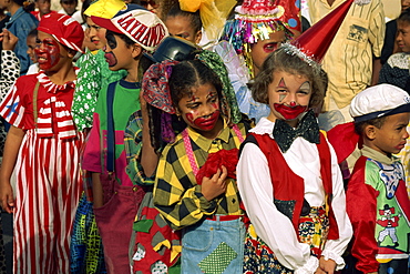 Portrait of children with painted faces during the Mardi Gras Festival in the city of Mindelo, Sao Vicente Island, Cape Verde Islands, off West Africa, Africa