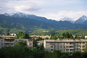 City apartments, Alma Ata, and Kungey-Ala-Too mountains, Kazakstan, Central Asia, Asia