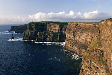 The Cliffs of Moher, rising to 230m in height, O'Brians Tower and Breanan Mor seastack, looking from Hags Head, County Clare, Munster, Eire (Republic of Ireland), Europe