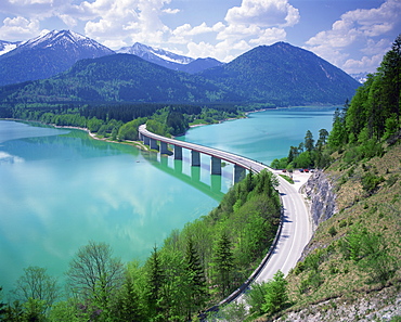 Road bridge over Lake Sylvenstein, with mountains in the background, in Bavaria, Germany, Europe