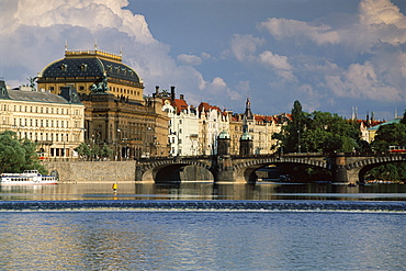 The National Theatre and house fronts along the Vltava River, Prague, Czech Republic, Europe