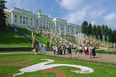 Tourists in front of fountains outside the Summer Palace at Petrodvorets in St. Petersburg, Russia, Europe