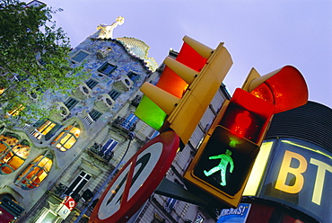 Casa Balli, Gaudi architecture, and street signs, Barcelona, Spain