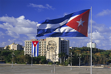 Cuban flag flying outside the Ministerio del Interior, Plaza de la Revolucion, Havana, Cuba, West Indies, Central America