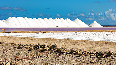 Stacks of salt beside large salt pans, Bonaire, ABC Islands, Dutch Antilles, Caribbean, Central America