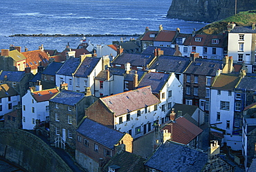 View over rooftops of the fishing village of Staithes, North Yorkshire coast, England, United Kingdom, Europe