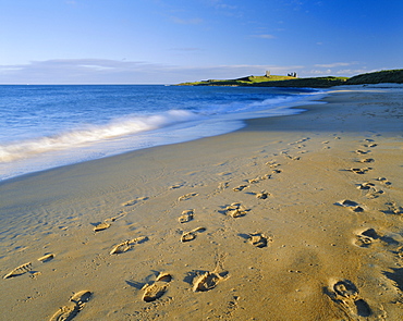 Dunstanburgh Castle (National Trust) from Embleton Bay, Northumberland, England