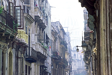 Street scene in Havana Viejo, with Capitolio Nacional in background, Havana (La Habana), Cuba, West Indies, Central America