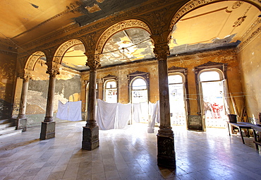 Interior of a once ornate and grand apartment building, now in a state of disrepair, Havana, Cuba, West Indies, Central America