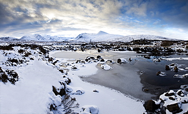 Winter view across Lochain na h'achlaise to the Black Mount hills at dusk, Rannoch Moor, Highland, Scotland, United Kingdom, Europe