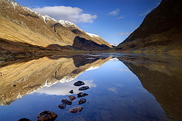 Winter view over Loch Achtriochtan along Glencoe with snow-capped  mountains and reflections, Glencoe, near Fort William, Highland, Scotland, United Kingdom, Europe