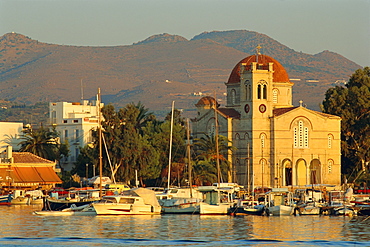 Town church and waterfront, Aegina, Argo-Saronic Islands, Greece, Europe