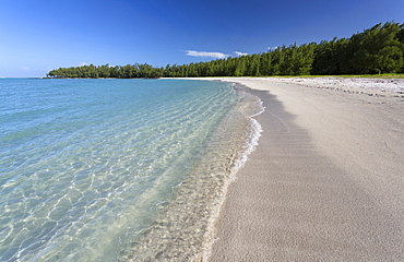 Idyllic beach scene with blue sky, aquamarine sea and soft sand, Ile Aux Cerfs, Mauritius, Indian Ocean, Africa