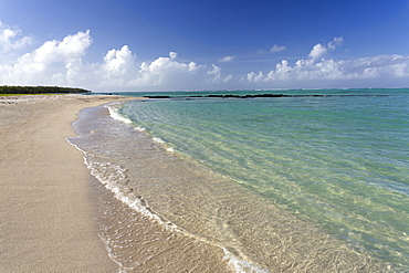 Idyllic beach scene with blue sky, aquamarine sea and soft sand, Ile Aux Cerfs, Mauritius, Indian Ocean, Africa