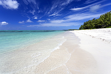 Idyllic beach scene with blue sky, aquamarine sea and soft sand, Ile Aux Cerfs, Mauritius, Indian Ocean, Africa