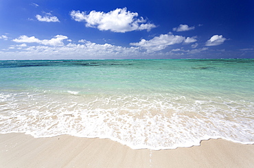 Idyllic beach scene with blue sky, aquamarine sea and soft sand, Ile Aux Cerfs, Mauritius, Indian Ocean, Africa