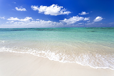 Idyllic beach scene with blue sky, aquamarine sea and soft sand, Ile Aux Cerfs, Mauritius, Indian Ocean, Africa