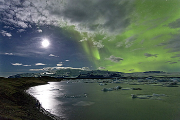 The Aurora Borealis (Northern Lights) captured in the night sky over Jokulsarlon glacial lagoon on the edge of the Vatnajokull National Park, during winter, South Iceland, Iceland, Polar Regions