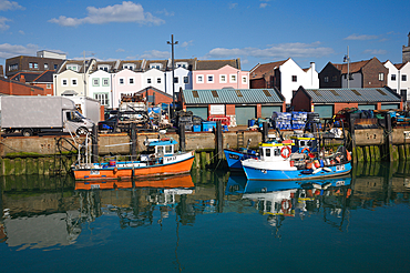 Fishing trawlers moored in the sheltered part of Portsmouth harbour