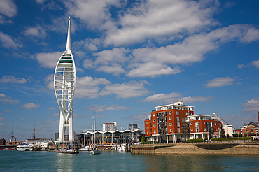 Portsmouth harbour waterfront with the Spinnaker tower, Gunwharf Quays shopping centre and modern apartments