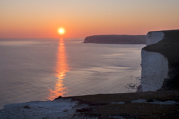 Seven Sisters chalk cliffs at sunset, South Downs National Park, East Sussex, England, United Kingdom, Europe