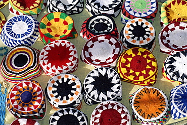 Colourful Nubian skullcaps for sale, Philae, Aswan, Egypt, North Africa, Africa