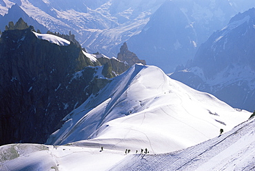 View from Mont Blanc towards Grandes Jorasses, with mountaineers on Cosmiques Ridge, Mont Blanc, French Alps, France, Europe