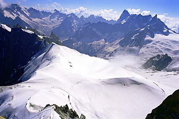 View from Mont Blanc towards Grandes Jorasses, with mountaineers on Cosmiques Ridge, Mont Blanc, French Alps, France, Europe