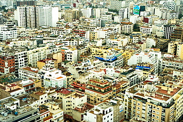 Aerial cityscape, patterned abstract of numerous white and yellow modern buildings, Casablanca, Morocco, North Africa, Africa