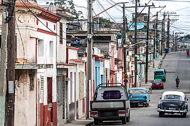 A jungle of telephone lines in a street behind the docks, Regla, Havana, Cuba