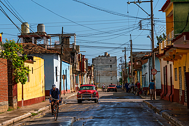 Typical backstreet under a panoply of telephone wires, Trinidad, Cuba