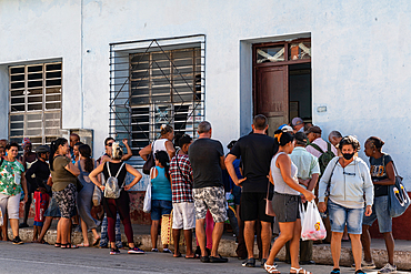 Queueing for both food and many services is a way of lifebecause of shortages, Trinidad, Cuba