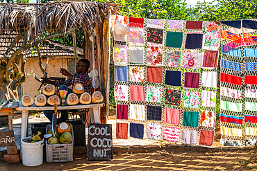 Local quilt blowing in the wind, by coconut shop, Valle de los Ingenios, near Trinidad, Cuba