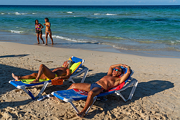 Lounging in the sun, Playas del Este, near Havana, Cuba