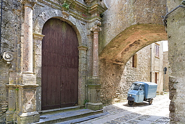 Erice, small truck parked under arch in back street, Sicily, Italy, Europe