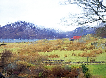 Rain on the window, looking out over farmland with snow on the hills of Skye across Kyle Rhea on a rainy day in late winter, Glenelg, Highland region, Scotland, United Kingdom, Europe