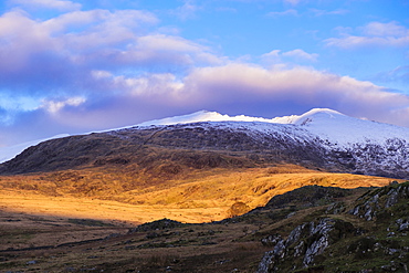 Late afternoon view to snow capped Mount Snowdon in winter in Snowdonia National Park, Rhyd Ddu, Gwynedd, Wales, United Kingdom, Europe