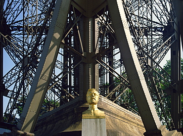 Bust of Gustav Eiffel under his famous landmark, the Eiffel Tower, Paris, France, Europe