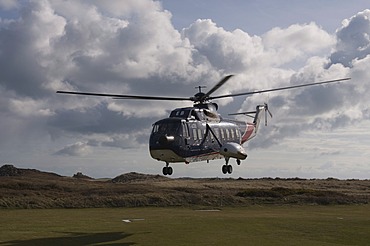 Helicopter landing at Tresco, Isles of Scilly, United Kingdom, Europe