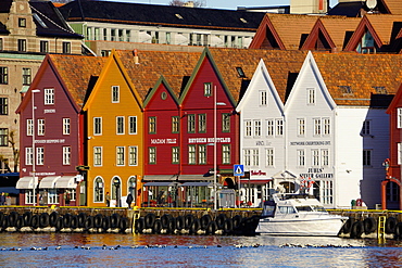 Traditional wooden Hanseatic merchants buildings of the Bryggen, UNESCO World Heritage Site, in harbour, Bergen, Hordaland, Norway, Scandinavia, Europe