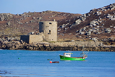 Fishing boat, Cromwell's Castle on Tresco, Isles of Scilly, England, United Kingdom, Europe