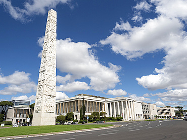 Obelisk in the centre of Piazza Marconi, Faschist architecture, EUR District, Rome, Lazio, Italy, Europe