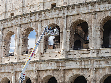 Workers inspecting The Colosseum, Rome, Lazio, Italy, Europe