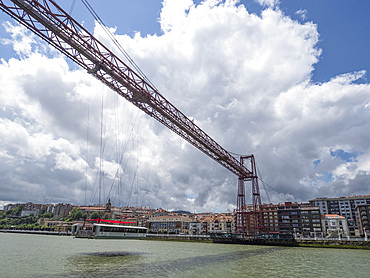 Gondola car moving along the Vizkaya Transporter Bridge over the River Nervion towards Portugalete, Getxo, near Bilbao, Basque Country, Spain, Europe