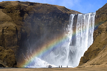 Rainbow over Skogafoss waterfall, South Iceland, Iceland, Polar Regions