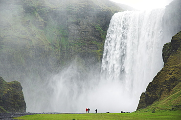 Tourists at Skogafoss waterfall, Skogar, South area, Iceland, Polar Regions