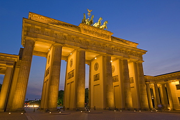 The Brandenburg Gate with the Quadriga winged victory statue on top illuminated at night, Pariser Platz, Berlin, Germany, Europe