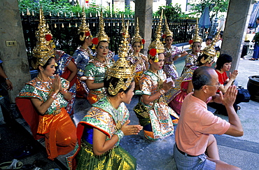 Thailand, Bangkok, Erawan Shrine Located In The Modern Town, Many Believers And Pilgrims Come Here For Praying And Getting Blessings, A Wealthy Donator Paid For A Dance To Be Performed