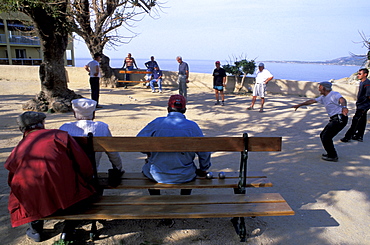 France, Corsica Island, Haute-Corse, Calvi, Men Playing Bowls (Boules)